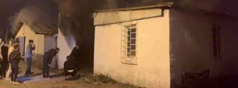 Hurdalık alanda çıkan yangın hortum deposuna sıçradı